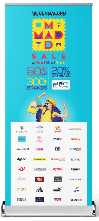Mockup of roll-up designed by Design Foundry for Mad Mad Sale run across various Virtuous Retail centres.